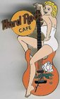 Blonde in White Swimsuit Sitting on Orange Guitar